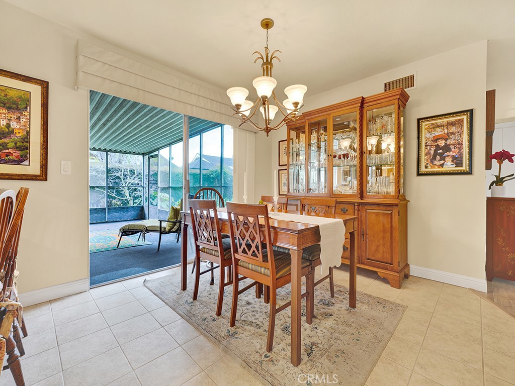 5092 Berkeley Avenue Westminster, CA 92683 - Photo 14 of 39 a view of a dining room with furniture window and outside view