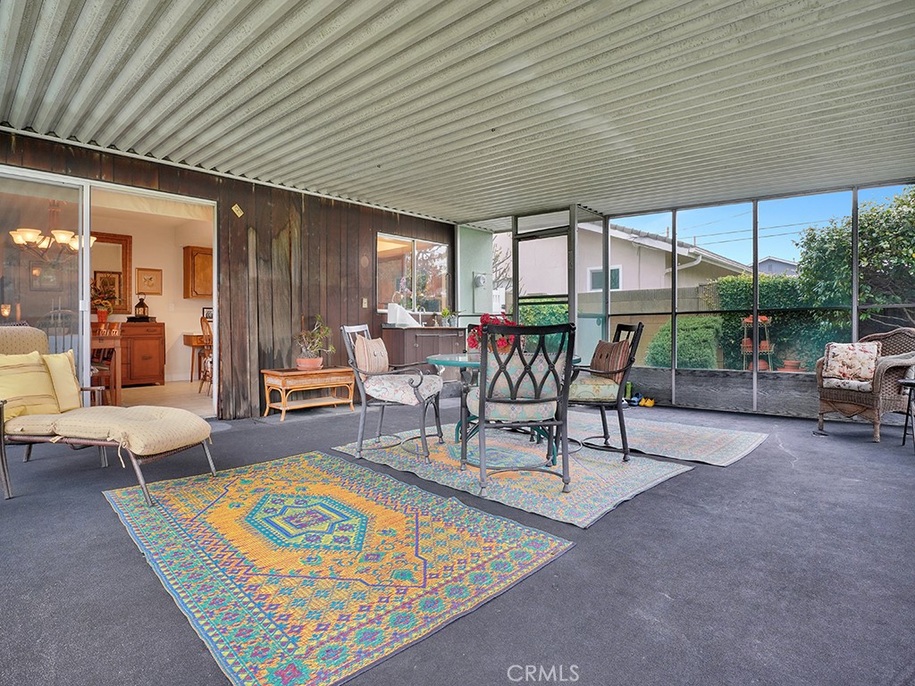 5092 Berkeley Avenue Westminster, CA 92683 - Photo 18 of 39 a patio with a table and chairs