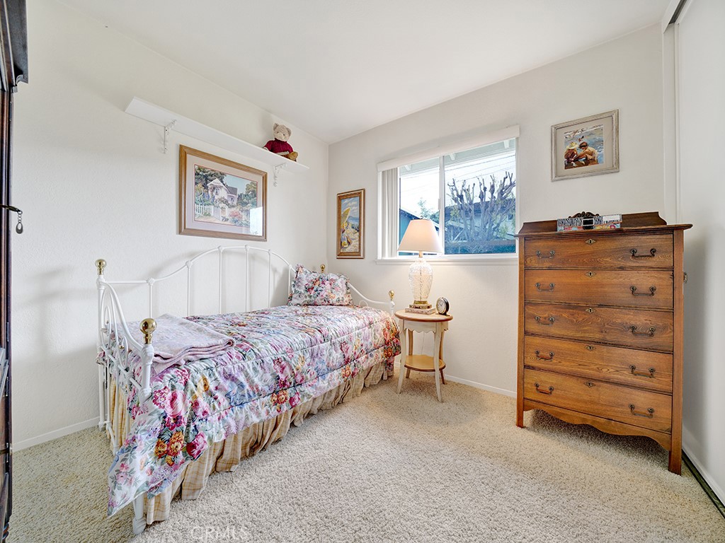 5092 Berkeley Avenue Westminster, CA 92683 - Photo 25 of 39 a bedroom with a bed and a window