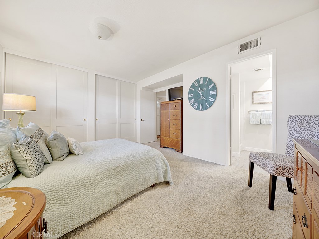 5092 Berkeley Avenue Westminster, CA 92683 - Photo 33 of 39 a bedroom with a bed and chair