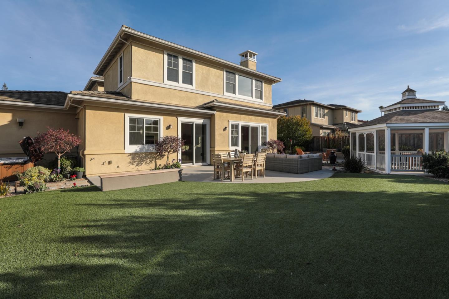 2718 Eden Lane Mountain View, CA 94040 - Photo 5 of 17 a front view of a house with a garden and patio