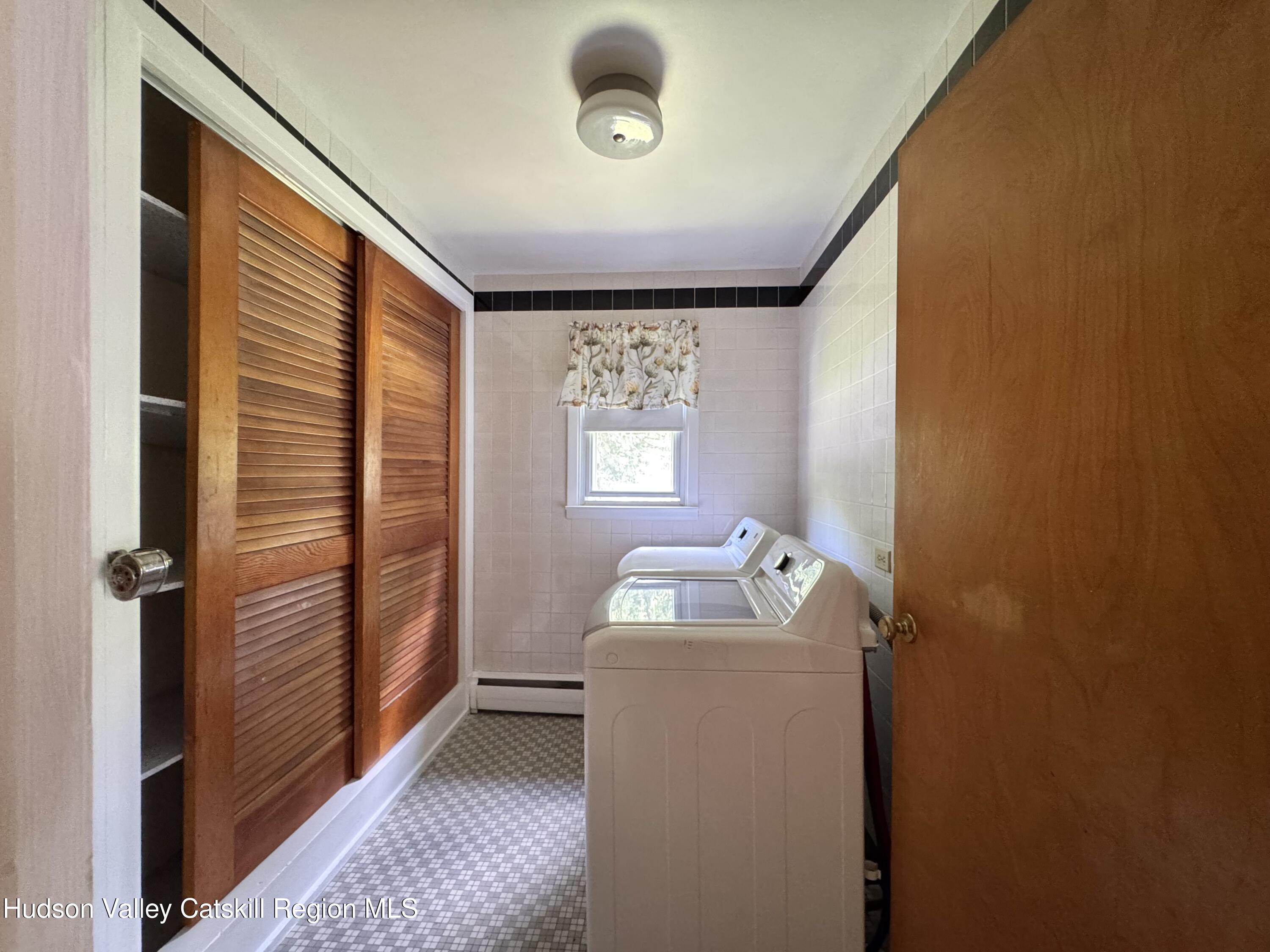 189-195 Vedder Road Catskill, NY 12414 - Photo 32 of 39 a room that has a bed and a window in it