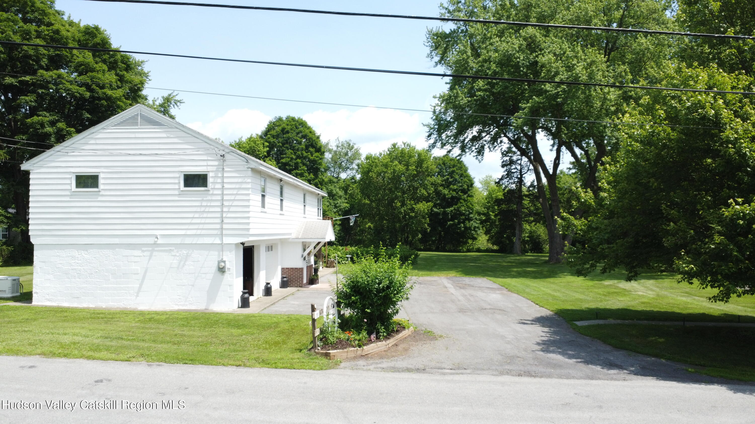 189-195 Vedder Road Catskill, NY 12414 - Photo 38 of 39 a view of a house with a yard