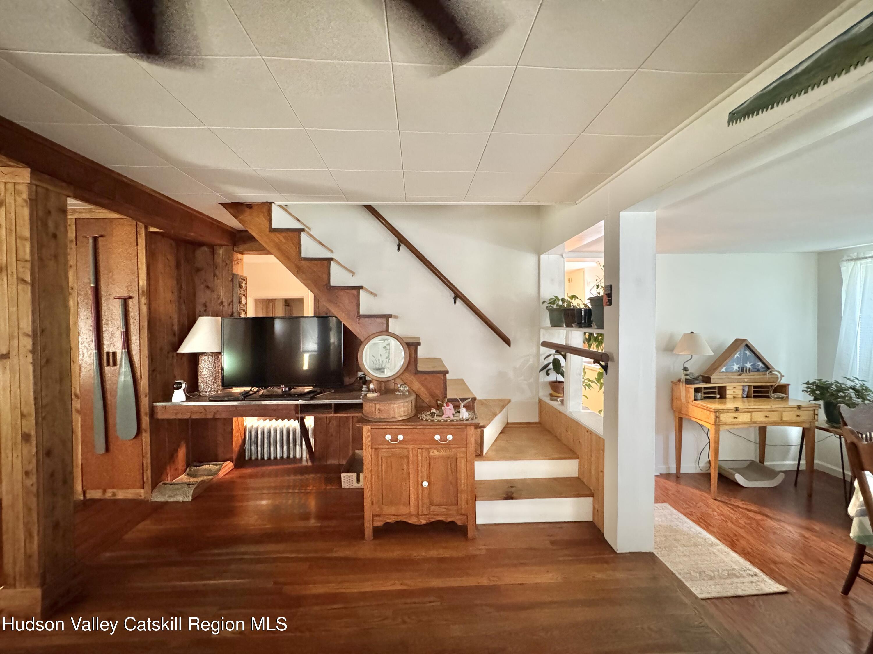 189-195 Vedder Road Catskill, NY 12414 - Photo 9 of 39 a living room with furniture and a flat screen tv