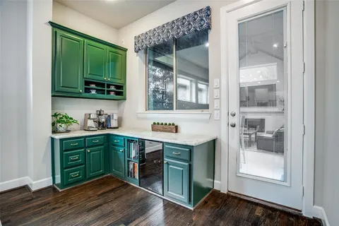 a kitchen with a sink and a window