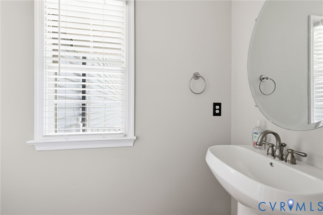 2018 Old Church Road Mechanicsville, VA 23111 - Photo 13 of 49 a bathroom with a sink and a window