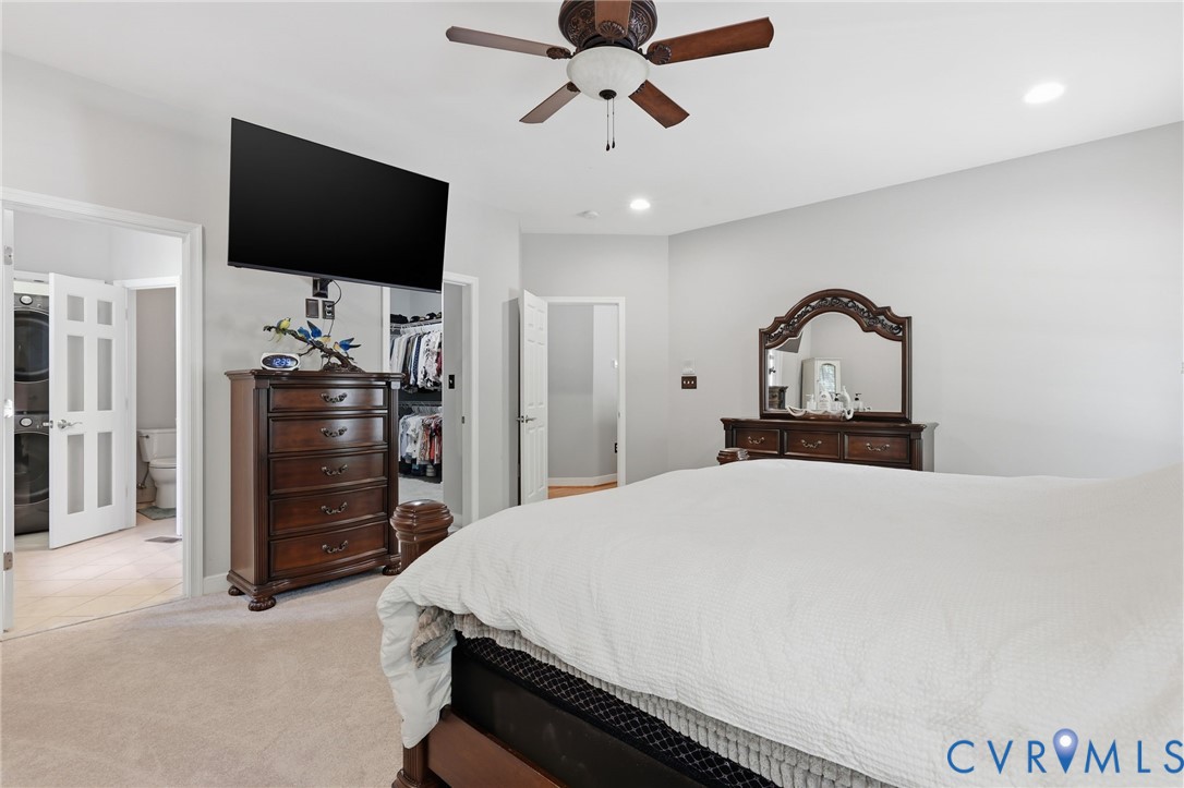 2018 Old Church Road Mechanicsville, VA 23111 - Photo 21 of 49 a bedroom with a bed and a flat screen tv