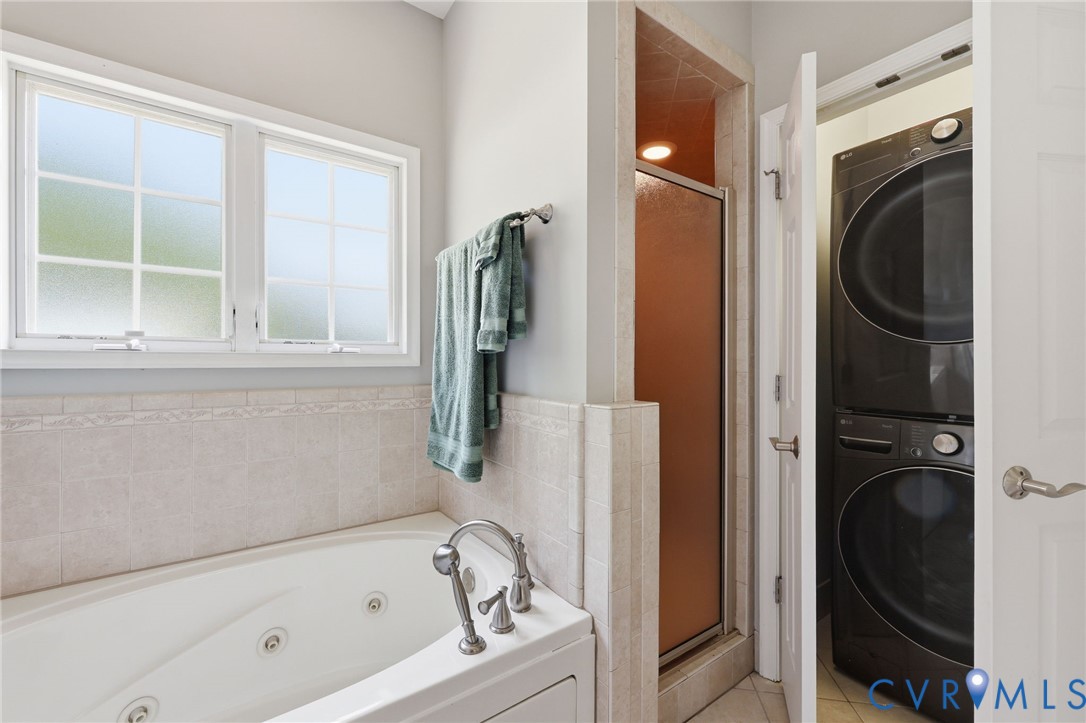 2018 Old Church Road Mechanicsville, VA 23111 - Photo 23 of 49 a bathroom with a bathtub and a window