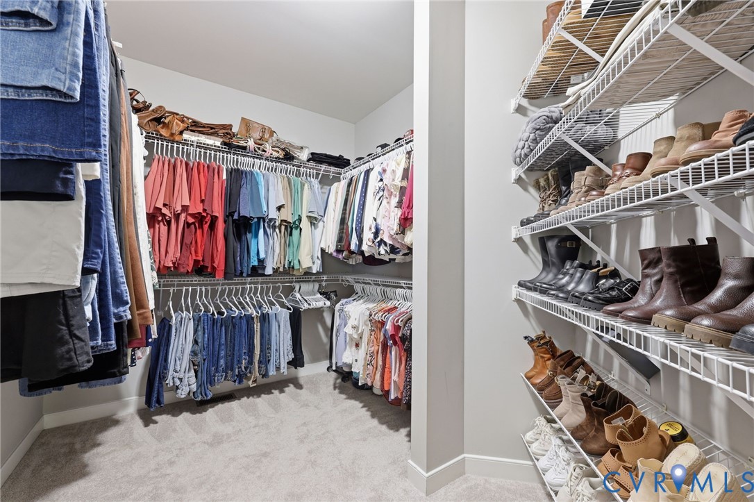 2018 Old Church Road Mechanicsville, VA 23111 - Photo 24 of 49 a view of walk in closet with clothes and shoes