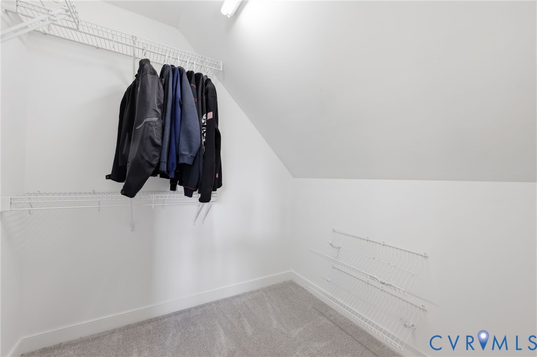 2018 Old Church Road Mechanicsville, VA 23111 - Photo 29 of 49 a view of walk in closet with clothes