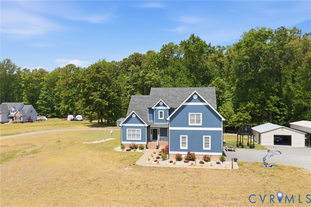 2018 Old Church Road Mechanicsville, VA 23111 - Photo 40 of 49 a front view of a house with a yard