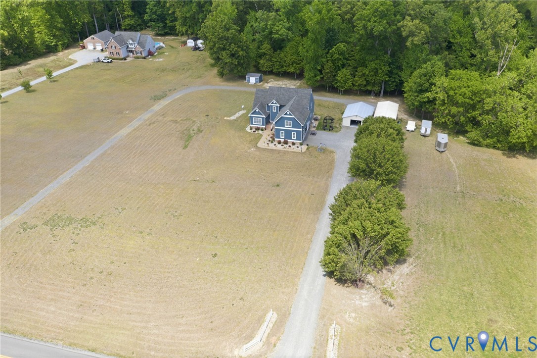 2018 Old Church Road Mechanicsville, VA 23111 - Photo 47 of 49 an aerial view of a house with a yard and trees all around