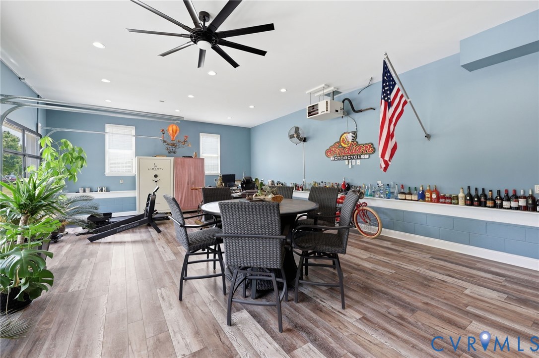 2018 Old Church Road Mechanicsville, VA 23111 - Photo 6 of 49 a view of a dining room with furniture window and wooden floor