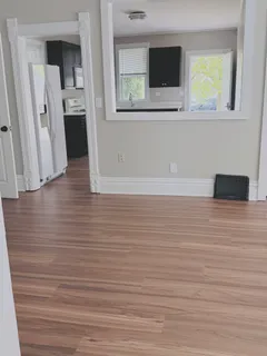a view of a living room with a flat screen tv