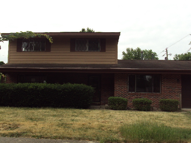 2901 Alton Drive Champaign, IL 61821 - Photo 1 of 19 a front view of a house with a yard