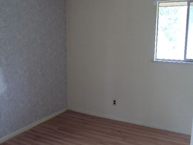 2901 Alton Drive Champaign, IL 61821 - Photo 12 of 19 a view of a small space with wooden floor and a window