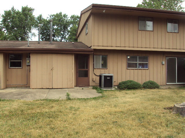 2901 Alton Drive Champaign, IL 61821 - Photo 18 of 19 a house with trees in the background