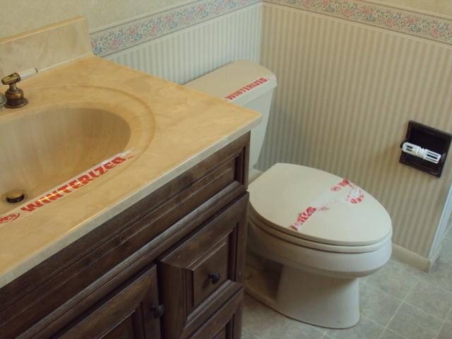 2901 Alton Drive Champaign, IL 61821 - Photo 6 of 19 a bathroom with a sink and toilet