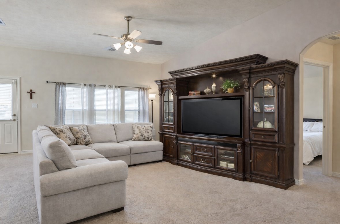 3015 Cimarron Pass Drive Spring, TX 77373 - Photo 2 of 11 a living room with furniture and a flat screen tv
