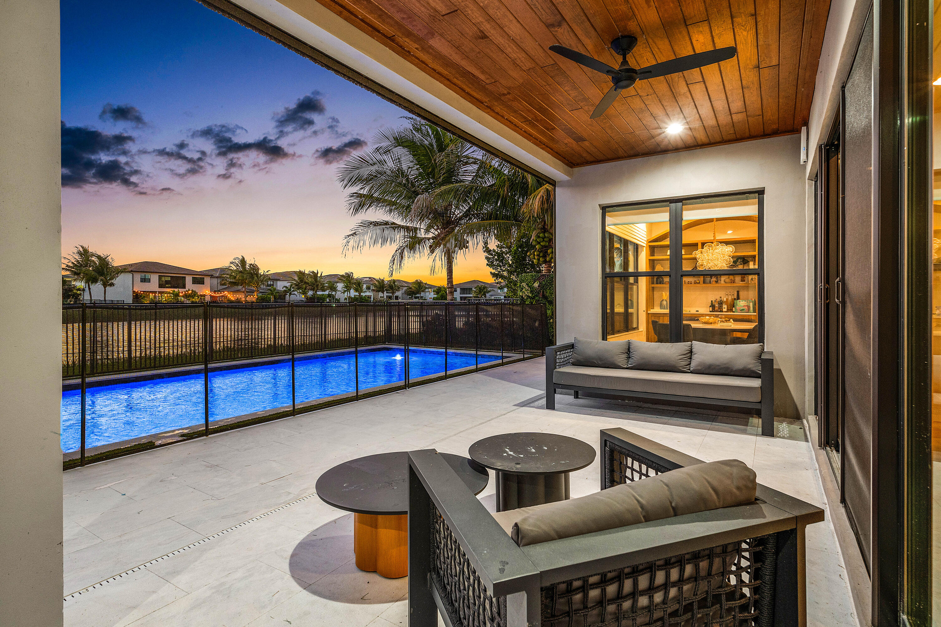 17099 Watersprite Lakes Road Boca Raton, FL 33496 - Photo 24 of 100 Back Covered Patio at Dusk