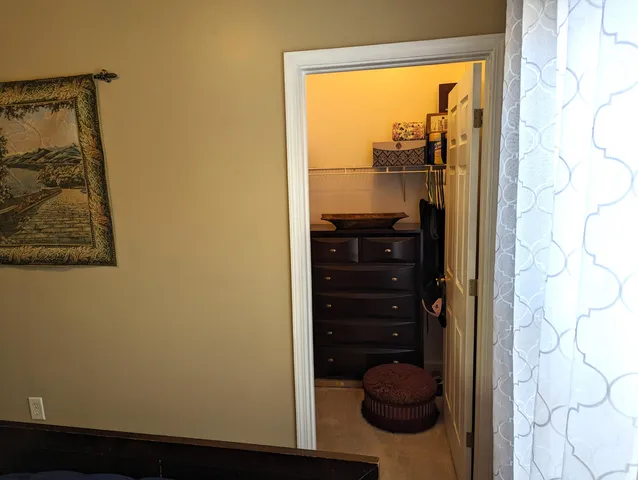 a bathroom with a sink vanity and a mirror