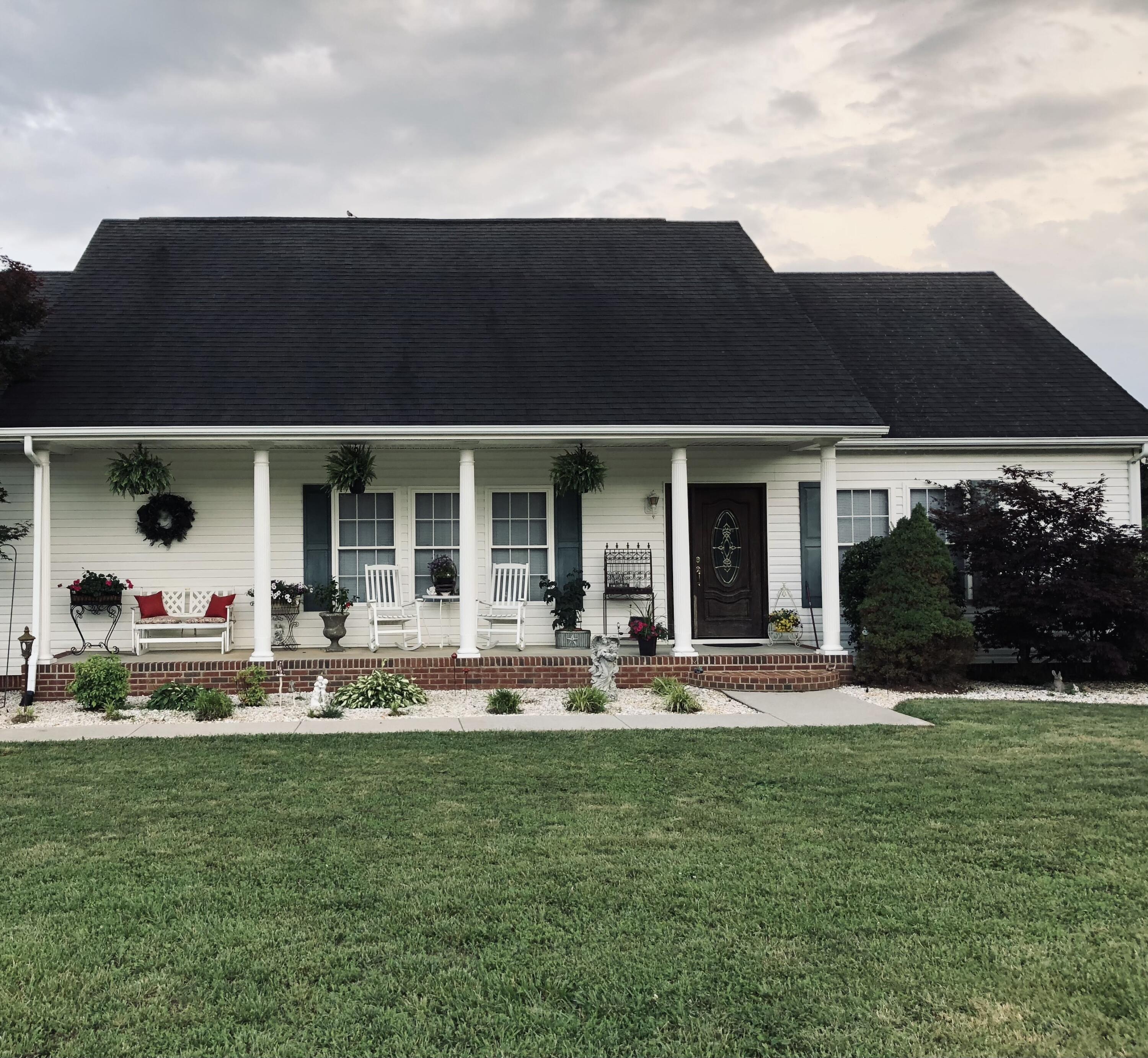 80 Bonbrook Road Wirtz, VA 24184 - Photo 2 of 53 front view of a house with a yard