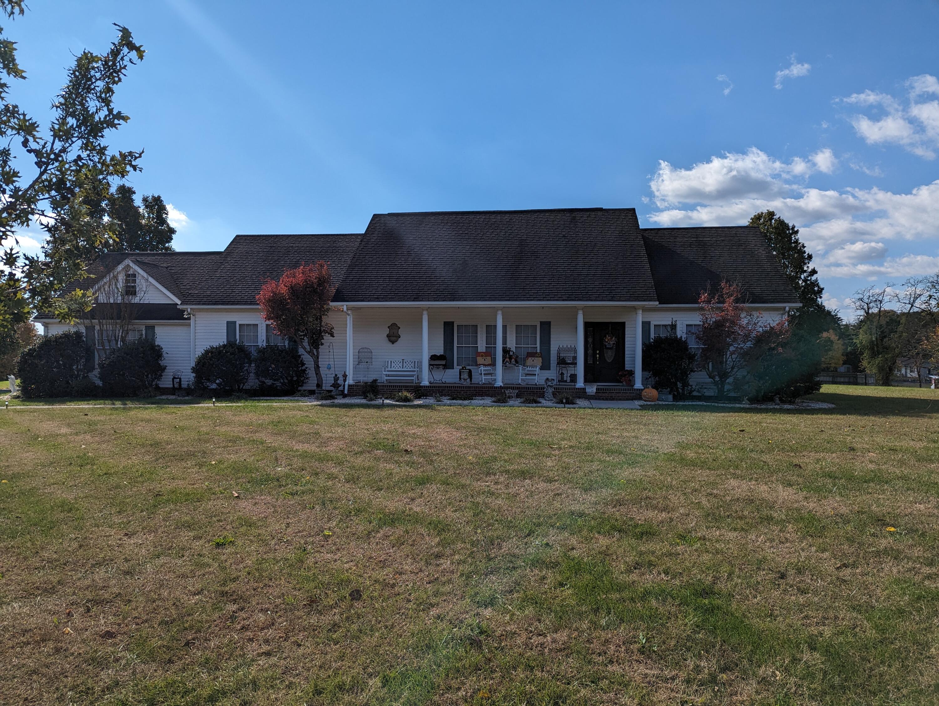 80 Bonbrook Road Wirtz, VA 24184 - Photo 21 of 53 a front view of a house with a garden and yard