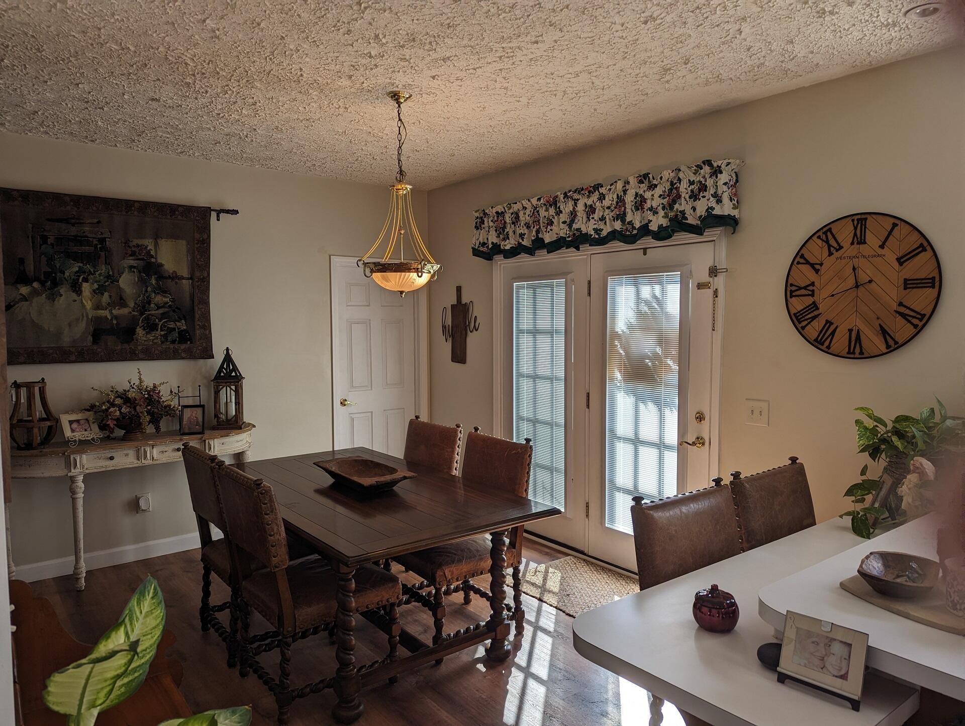 80 Bonbrook Road Wirtz, VA 24184 - Photo 30 of 53 a view of a dining room with furniture and chandelier