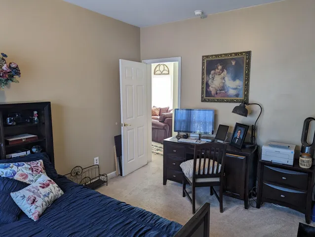 a room with lots of different colored cloths