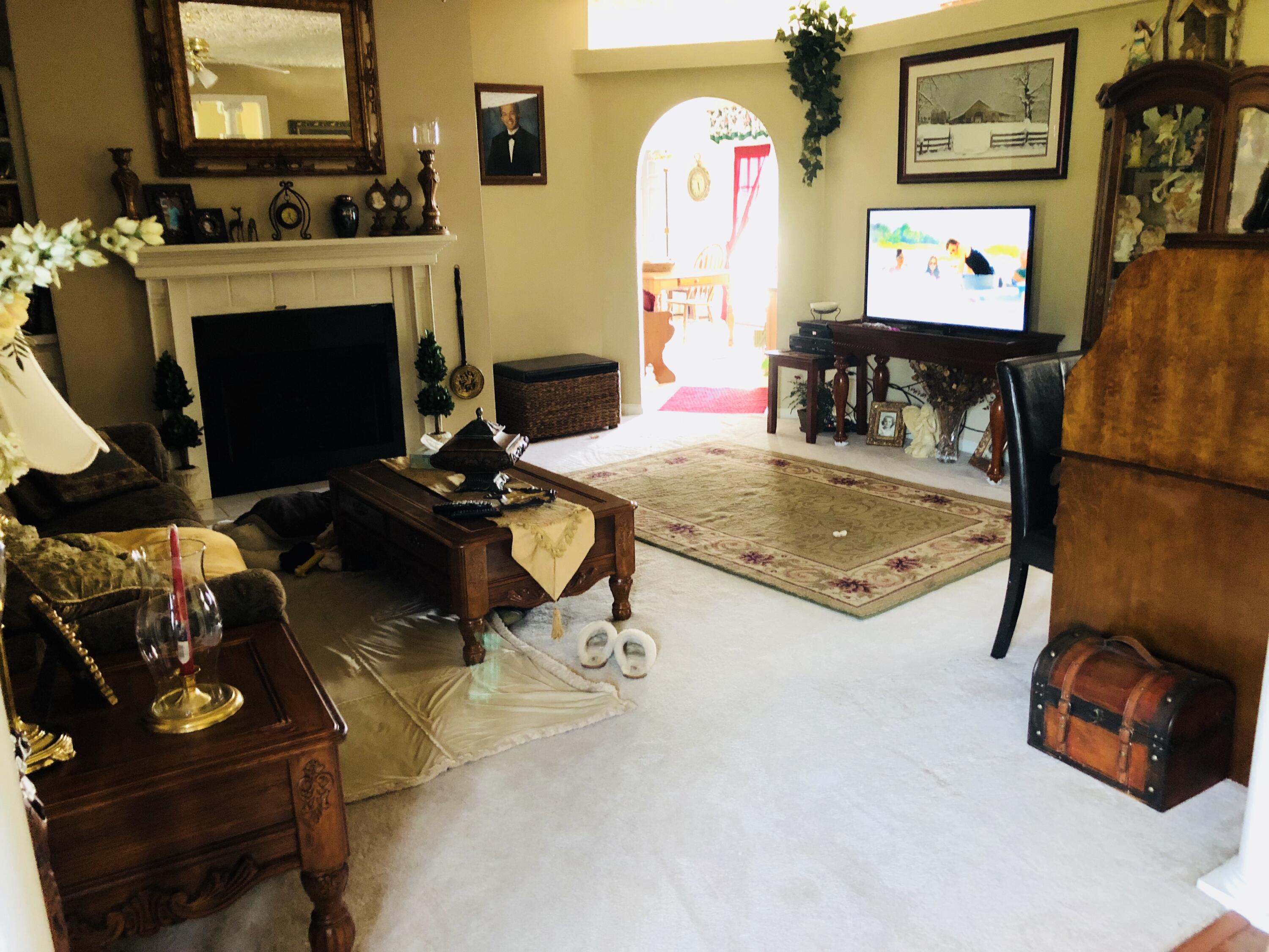 80 Bonbrook Road Wirtz, VA 24184 - Photo 4 of 53 a living room with furniture and a flat screen tv