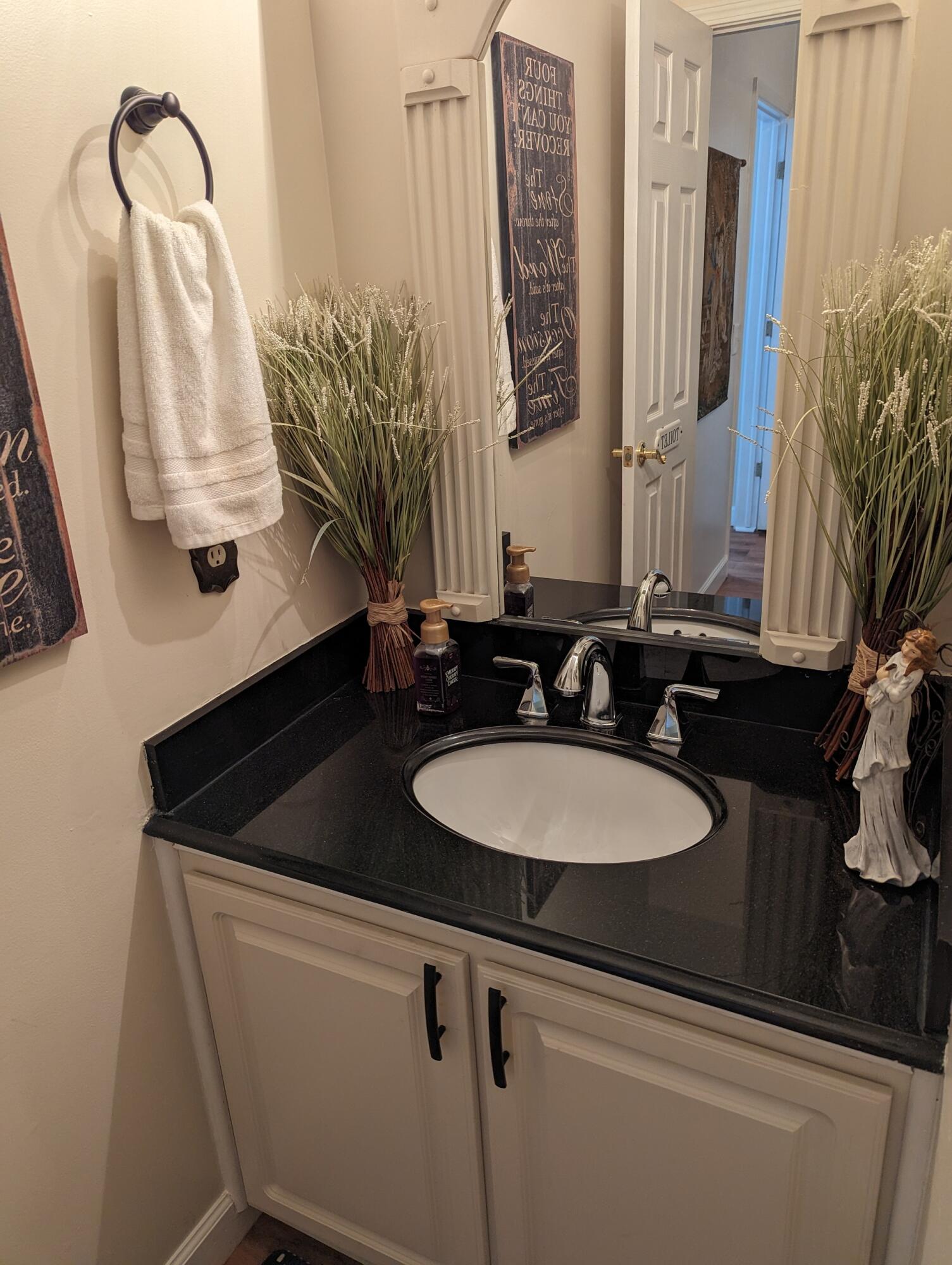 80 Bonbrook Road Wirtz, VA 24184 - Photo 52 of 53 a bathroom with a sink and a mirror