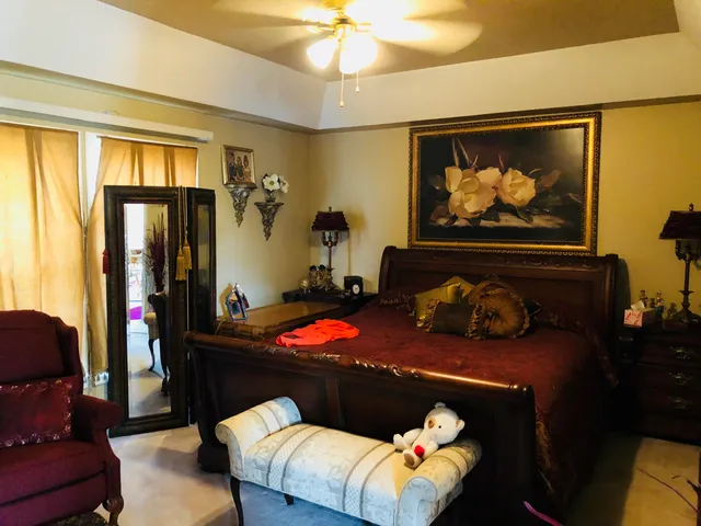 a bedroom with furniture and a bed