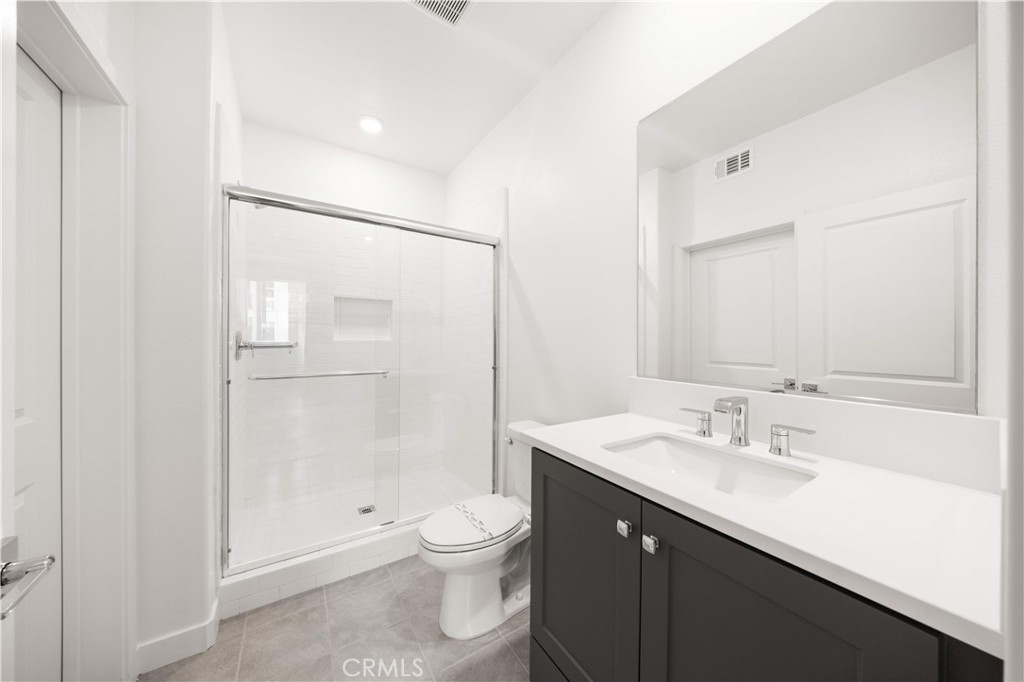 312 Tank Irvine, CA 92618 - Photo 11 of 68 a bathroom with a sink a toilet and shower