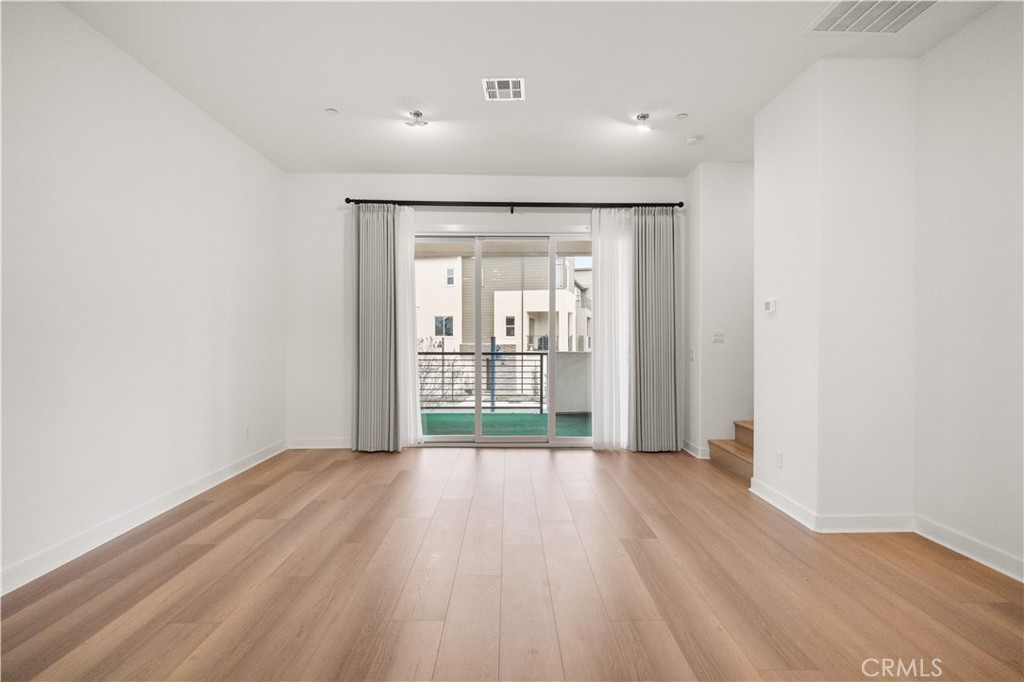 312 Tank Irvine, CA 92618 - Photo 22 of 68 wooden floor in an empty room with a window