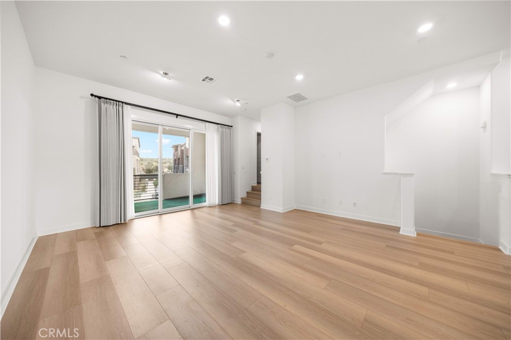 312 Tank Irvine, CA 92618 - Photo 23 of 68 a view of an empty room with wooden floor