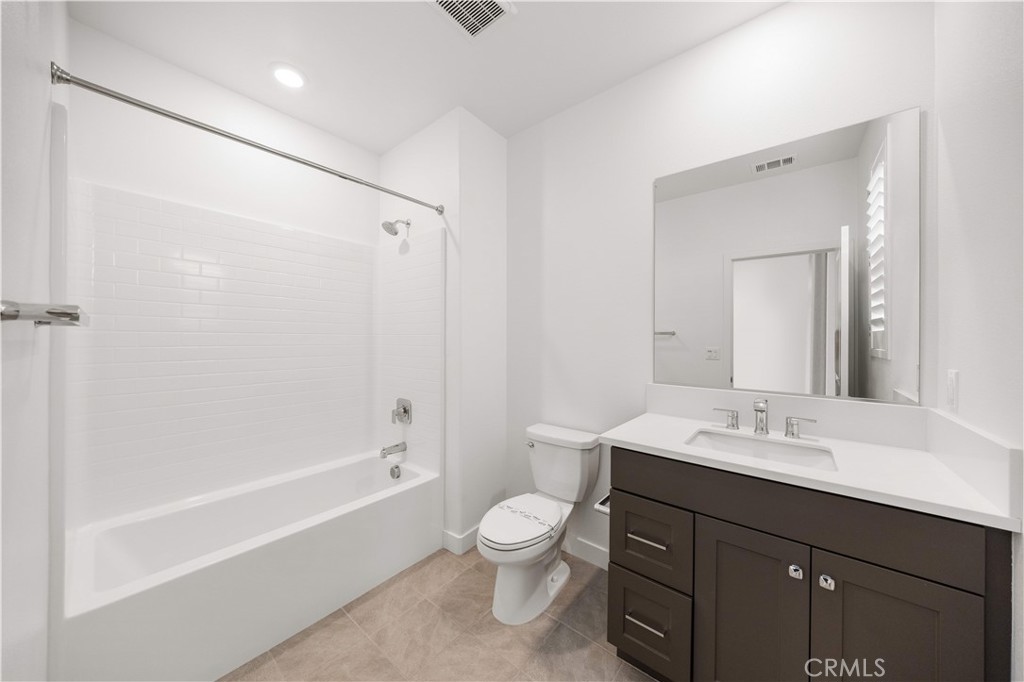 312 Tank Irvine, CA 92618 - Photo 31 of 68 a bathroom with a sink a toilet and shower