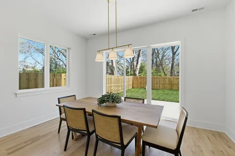a bathroom with a granite countertop sink mirror and double