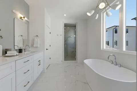 an aerial view of a house with a garden and plants