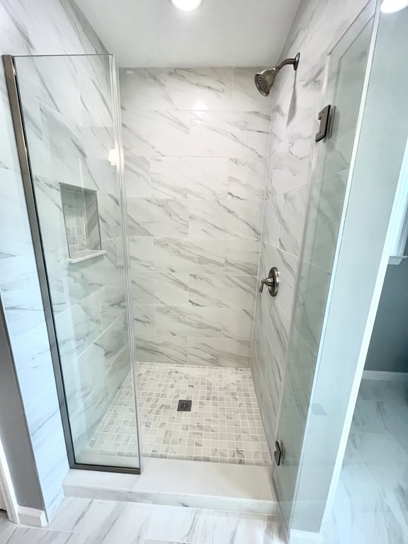 26 Apthorp Street Worcester, MA 01606 - Photo 6 of 13 a bathroom with a glass door shower