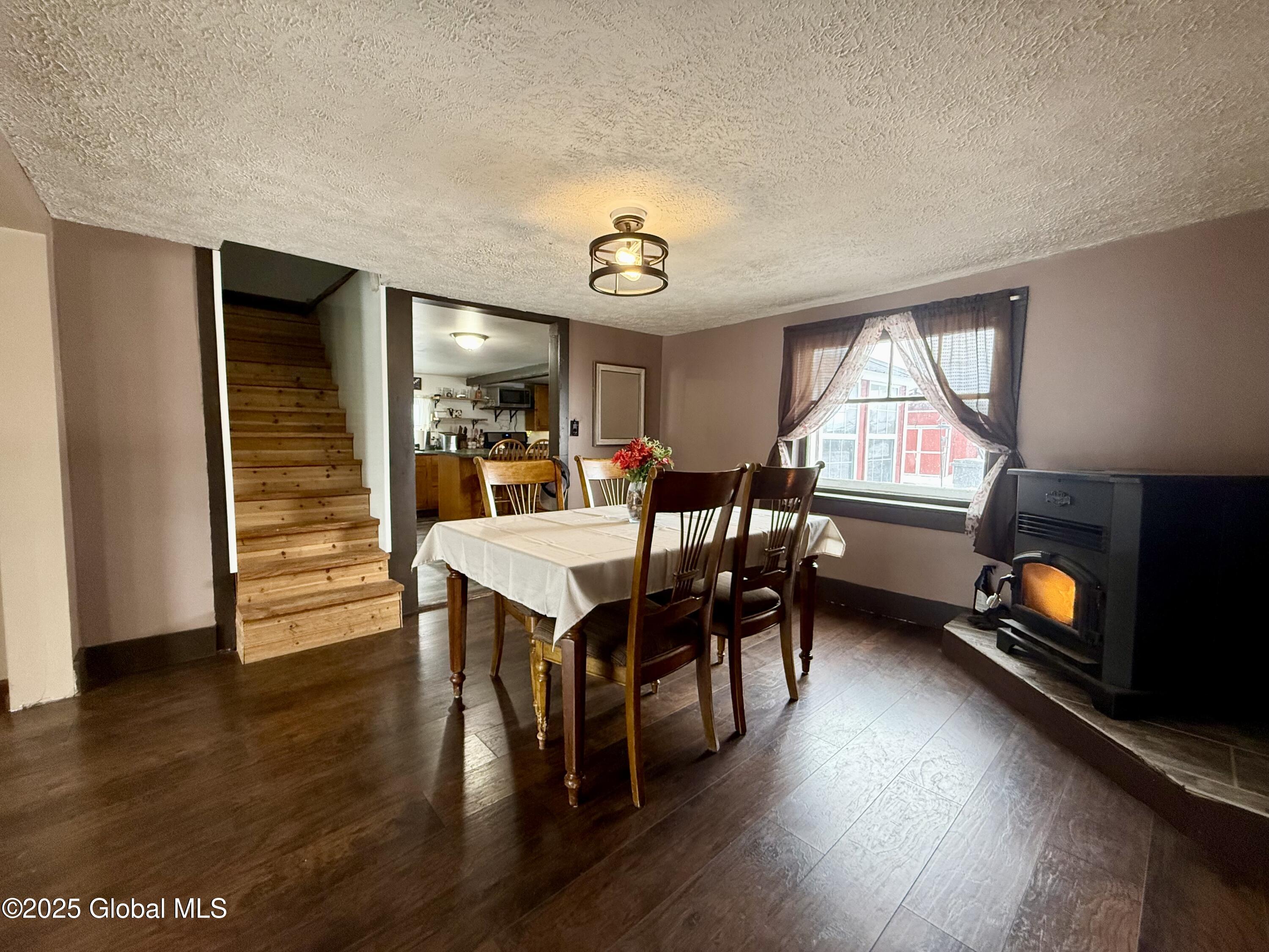 1558 Towpath Road Kingsbury, NY 12839 - Photo 10 of 60 Dining Room W/Pellet Stove