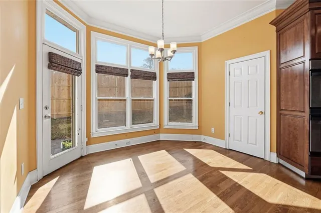 a view of a room with windows