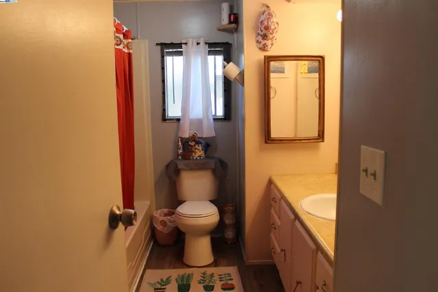a bathroom with a sink and toilet