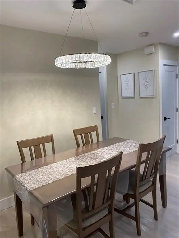 65 Louis Street, Unit A Barnstable, MA 02601 - Photo 16 of 28 a view of a dining room with furniture