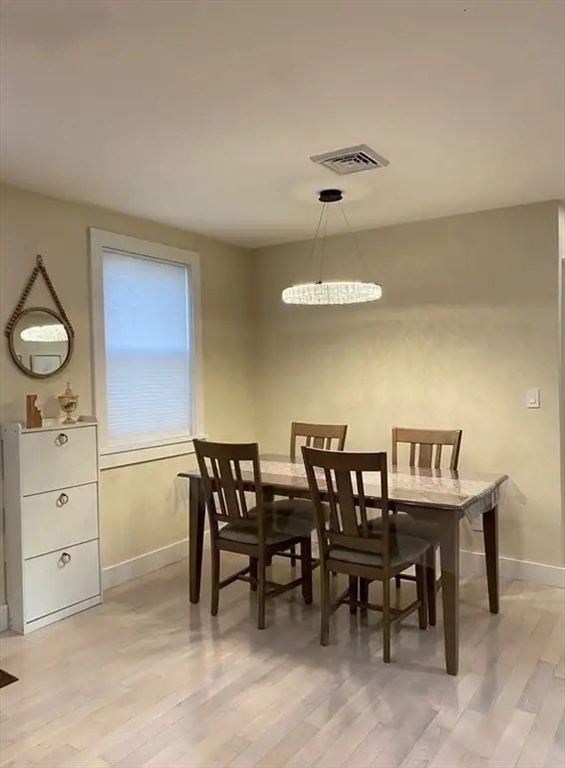 65 Louis Street, Unit A Barnstable, MA 02601 - Photo 17 of 28 a view of a dining room with furniture