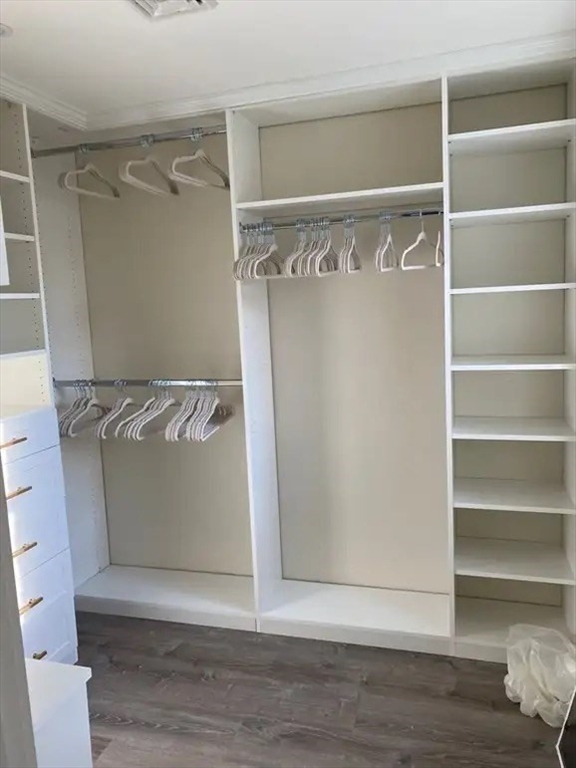 65 Louis Street, Unit A Barnstable, MA 02601 - Photo 21 of 28 a view of walk in closet with empty racks