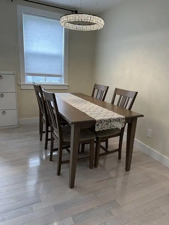 65 Louis Street, Unit A Barnstable, MA 02601 - Photo 7 of 28 a view of a dining room with furniture