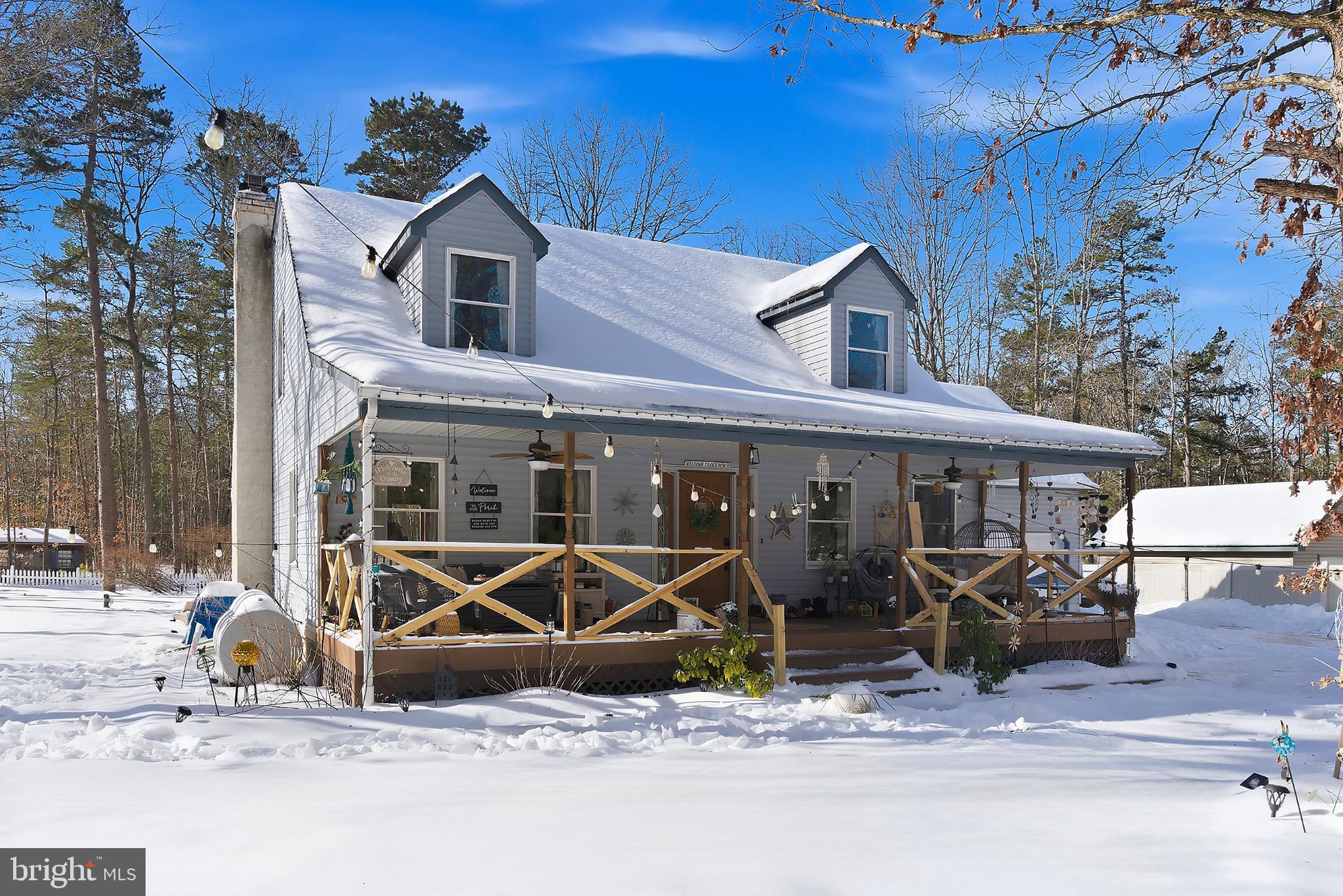 a front view of a house with patio