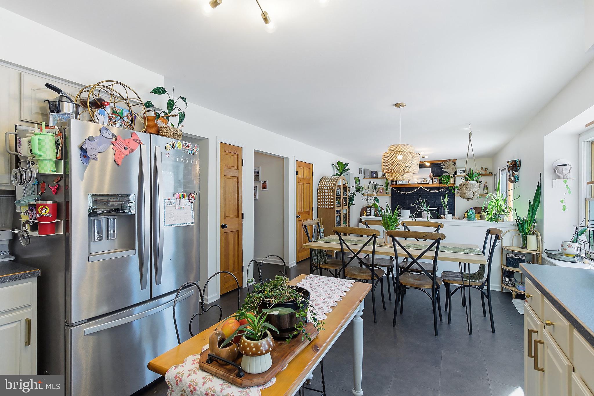 128 Highway 72 Vincentown, NJ 08088 - Photo 16 of 32 a kitchen with stainless steel appliances granite countertop a refrigerator and a dining table