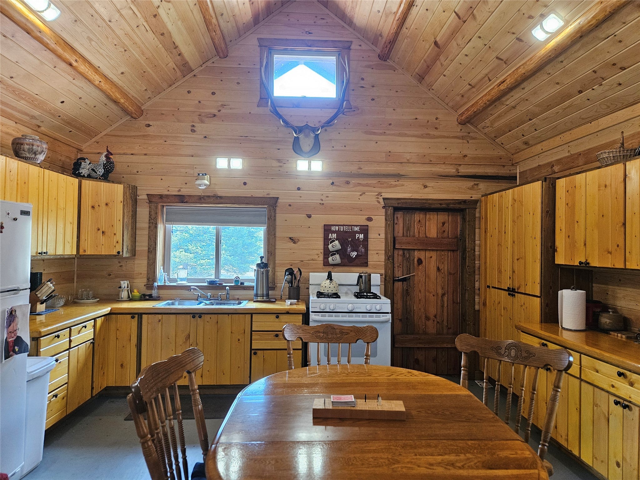 8880 Elk Trail Loop Lincoln, MT 59639 - Photo 15 of 55 gathering and kitchen cabin