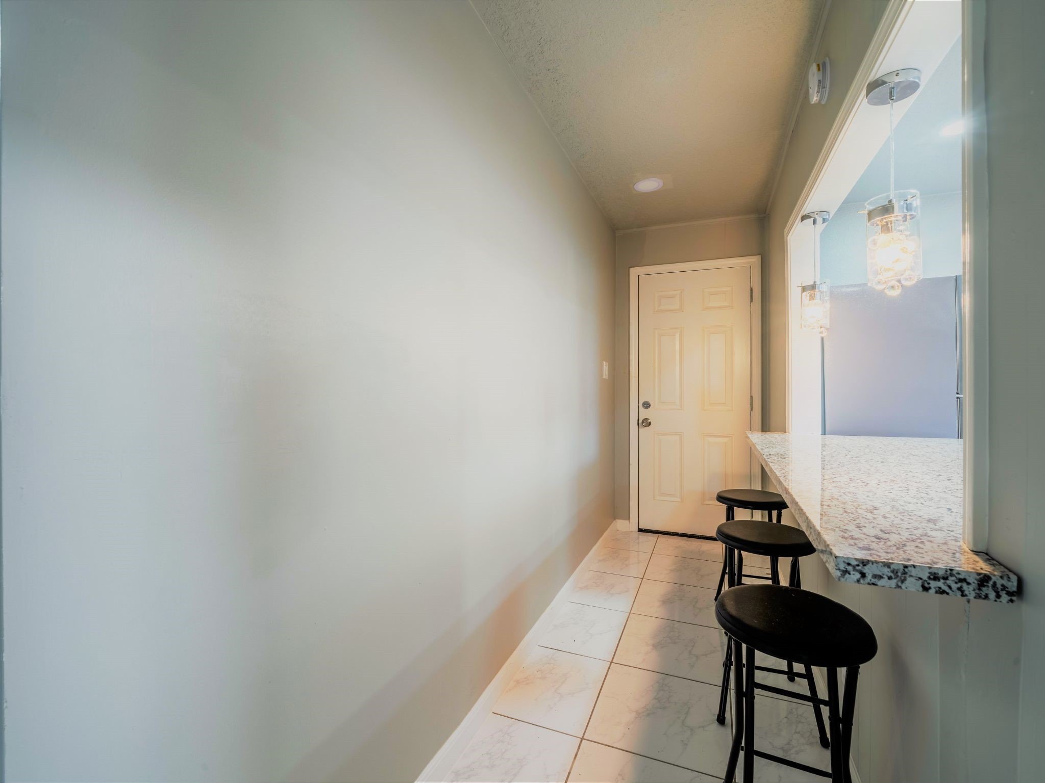 428 Gans Street Houston, TX 77029 - Photo 3 of 23 Bright breakfast bar area with overhead lighting and an open feel. Great for casual dining or morning coffee.